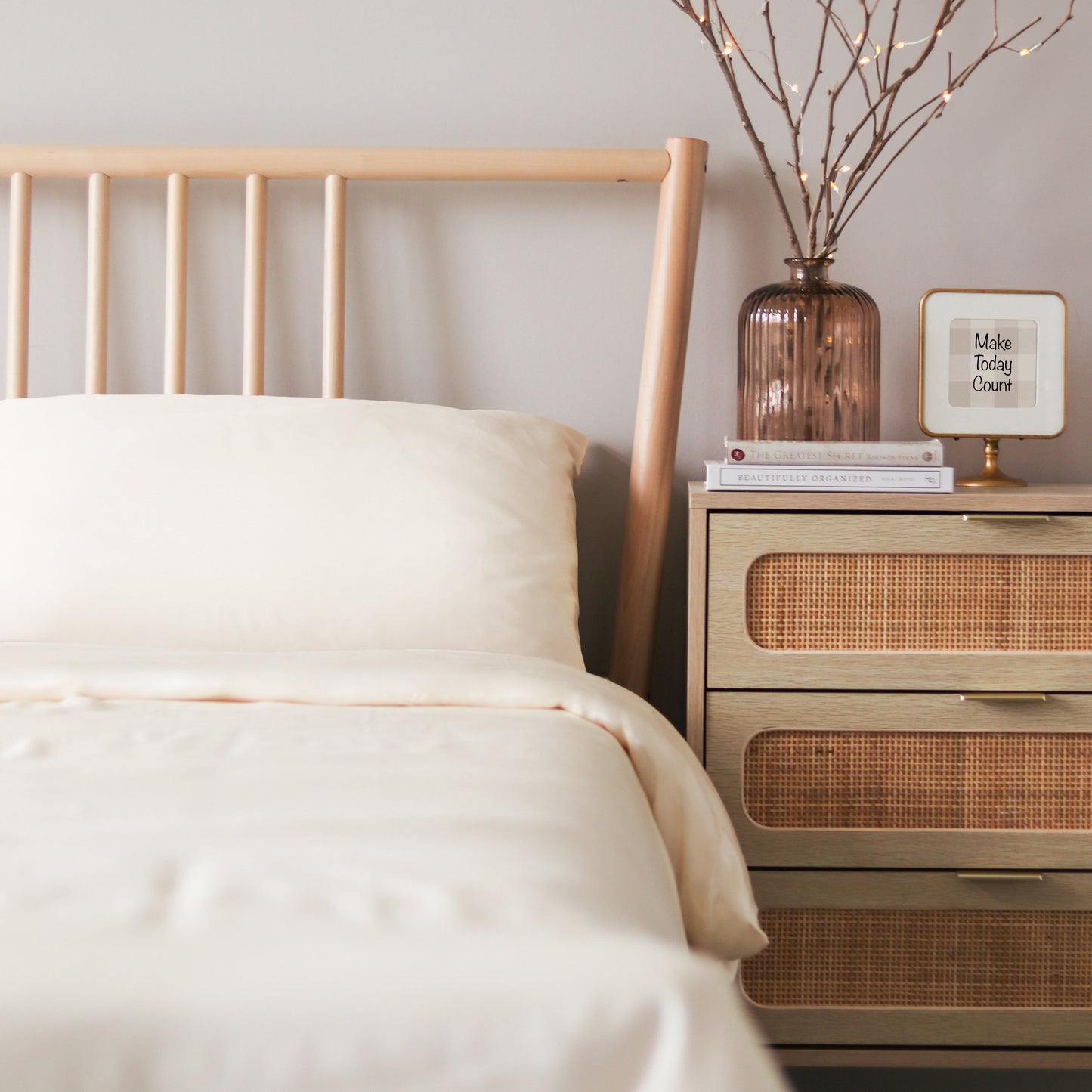 Elegant and inviting bed dressed in ultra-soft, durable Tencel sheets, offering a perfect blend of style and comfort.