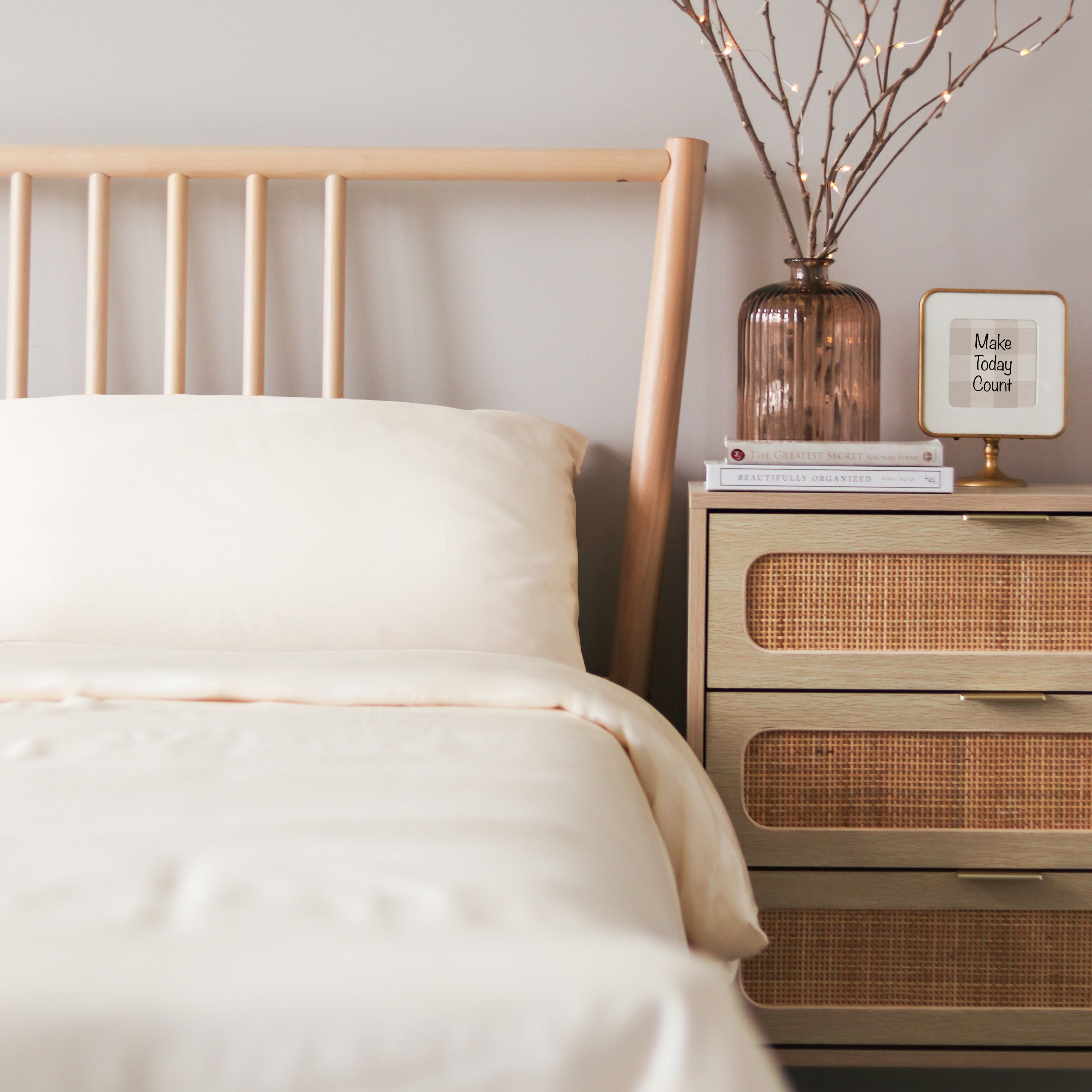 Elegant and inviting bed dressed in ultra-soft, durable Tencel sheets, offering a perfect blend of style and comfort.